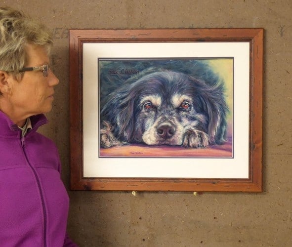 A custom framed Pastel of a dog