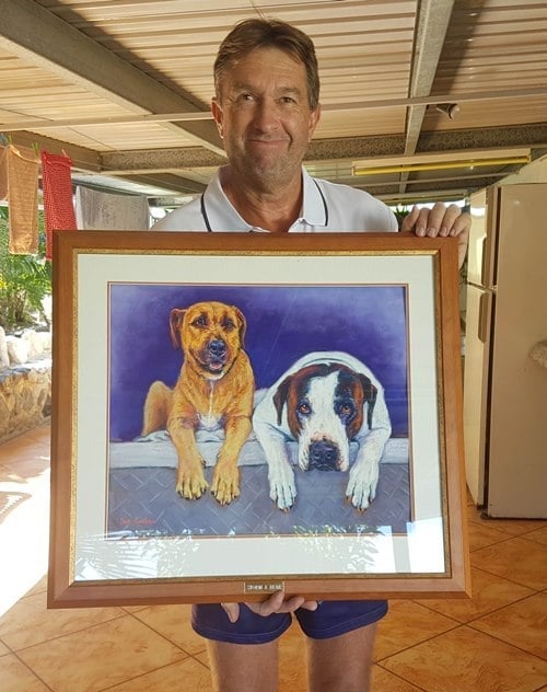 Rob is thrilled with his memorial gift pet portrait of his 2 hunting dogs painted from a photo