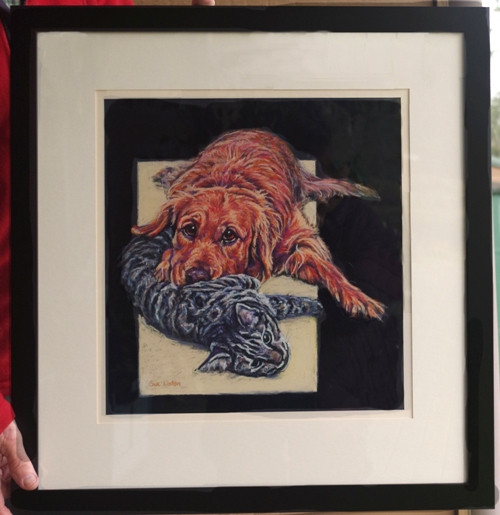 The custome framed portrait of a cat and dog